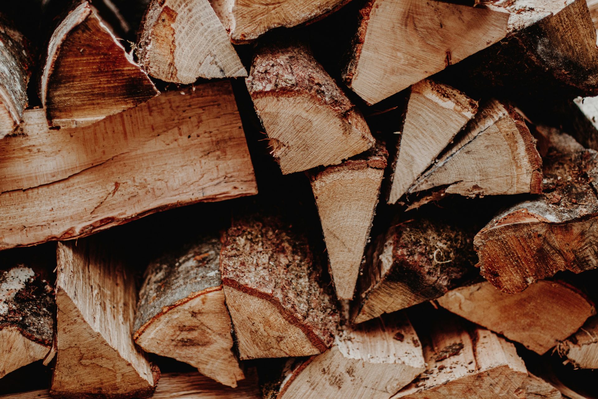 a pile of chopped wood sitting on top of each other